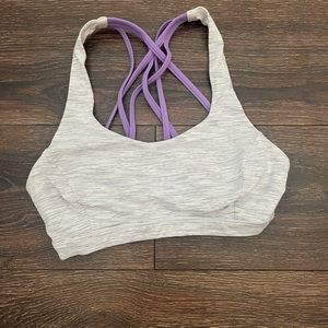Size 4 white and purple lululemon sports bra hardly used